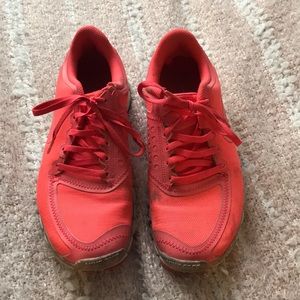Neon pink Nike Free 5.0